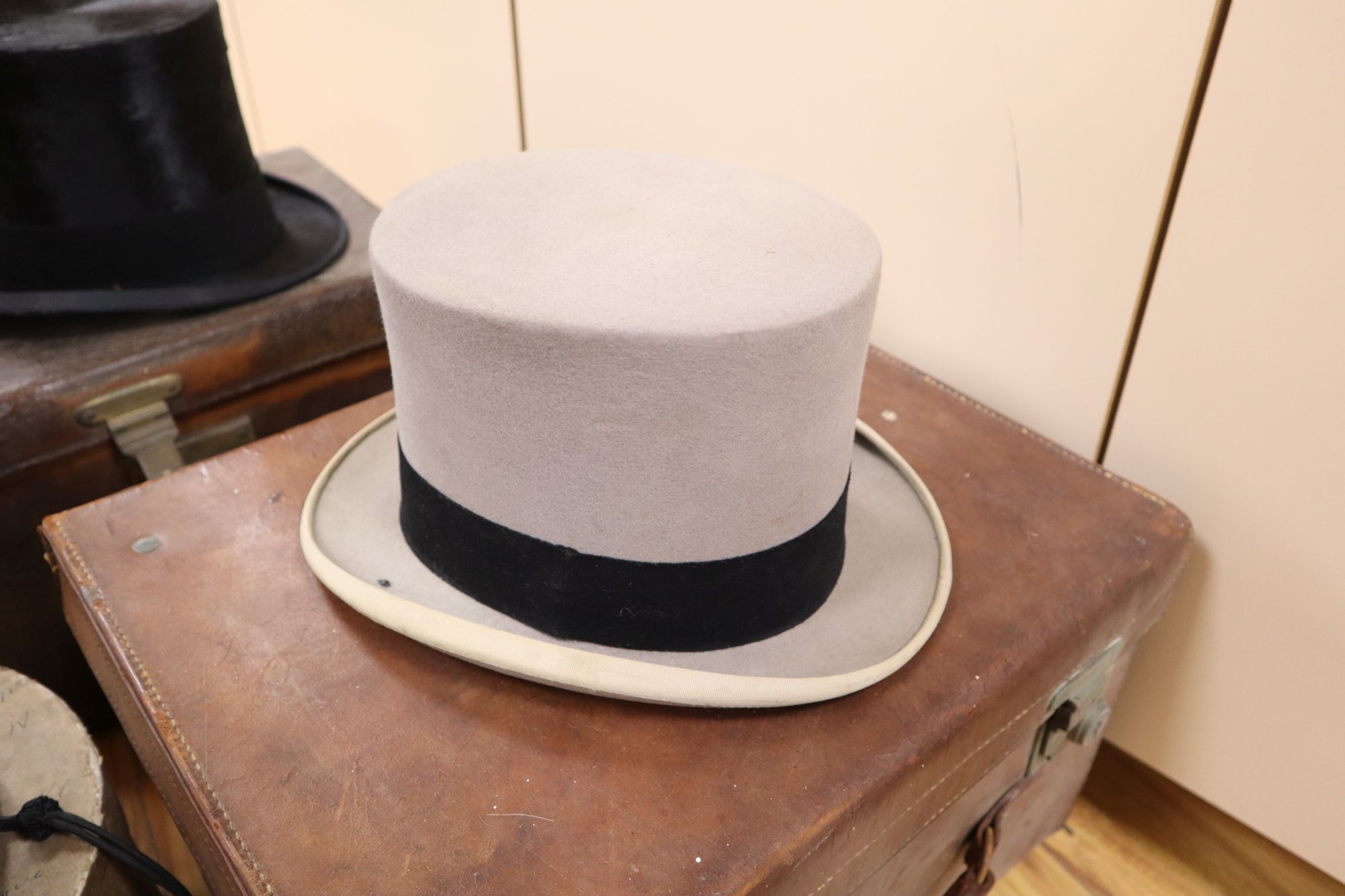 Two Victorian Locke & Co silk top hats and two felt top hats